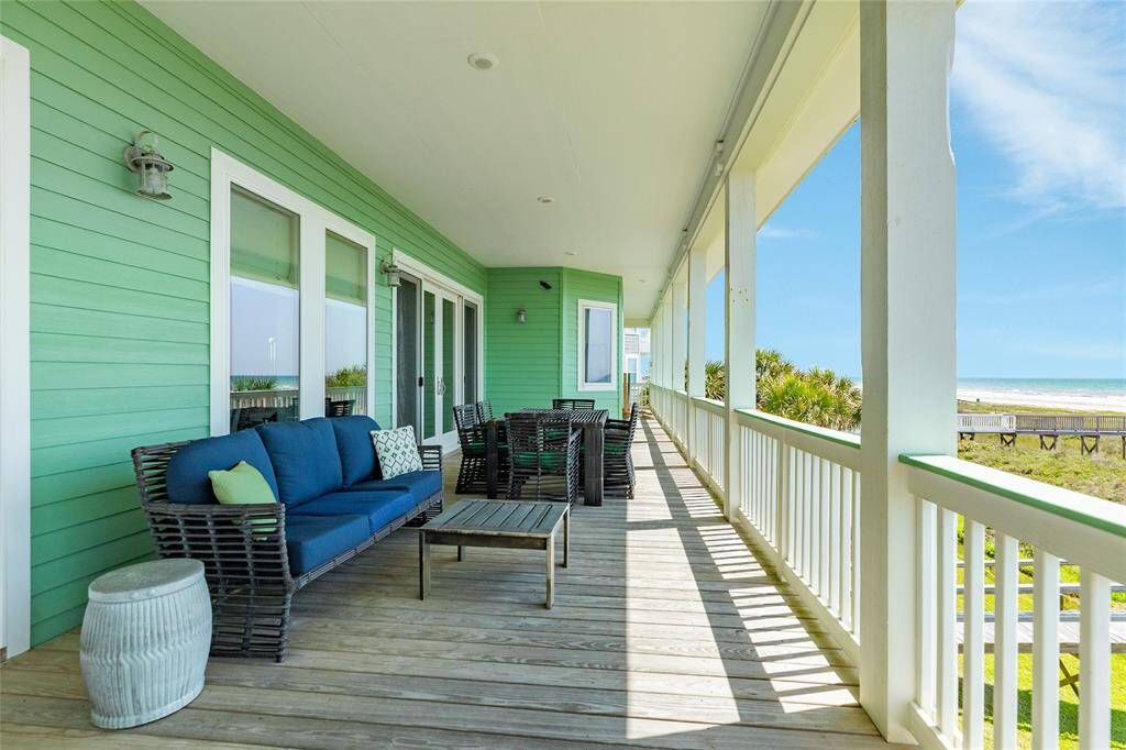 Step out onto the massive covered deck which has plenty of room for multiple seating areas
