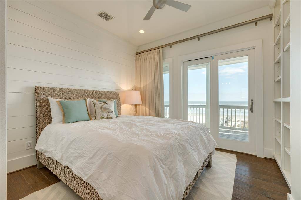 Bedroom 3 has built-in shelves and shares a Jack-N-Jill bathroom