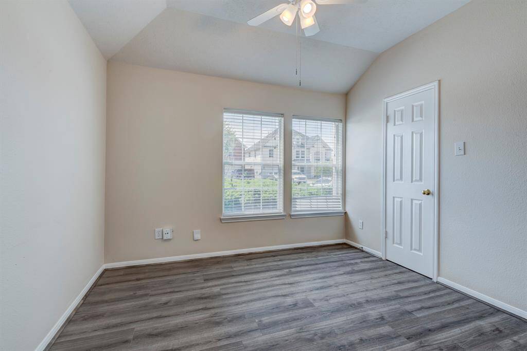 Bedroom 2, also with high ceiling