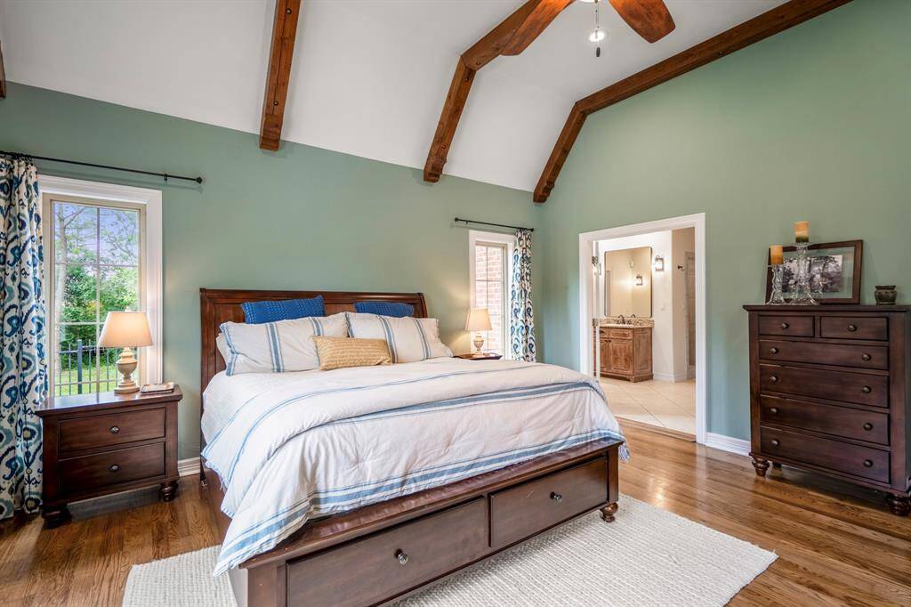 View from the primary bedroom into the elegant en-suite bath.