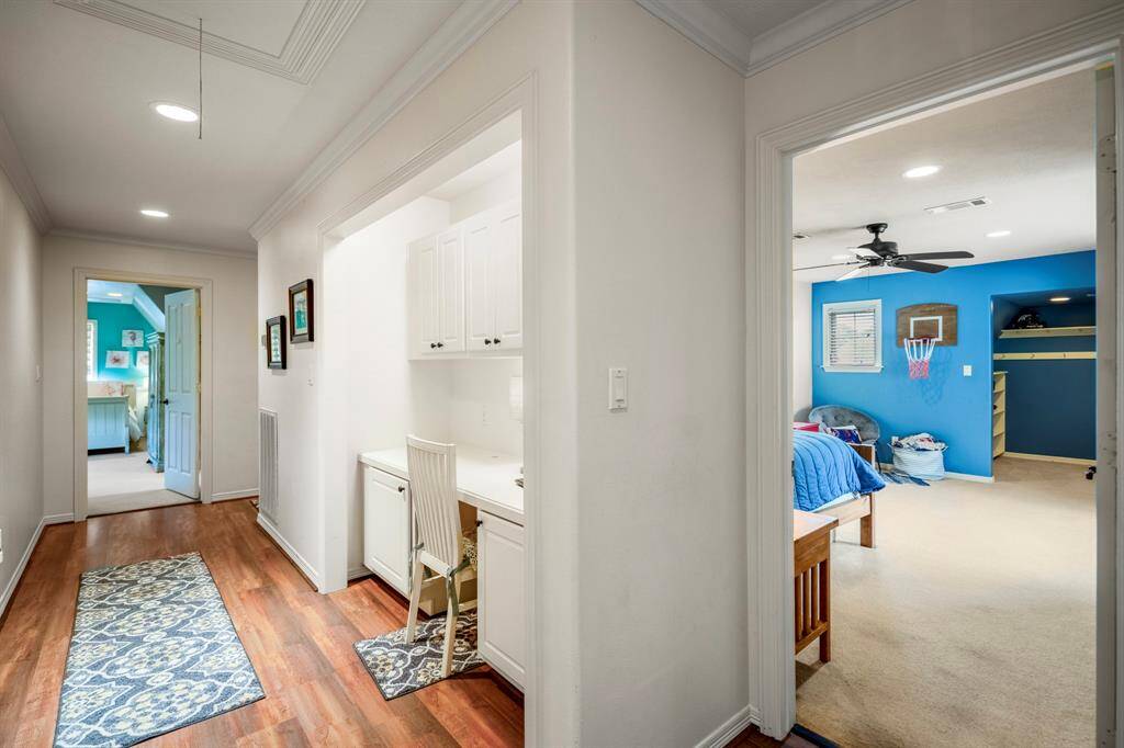 Hallway desk area is perfect for storage and studying.
