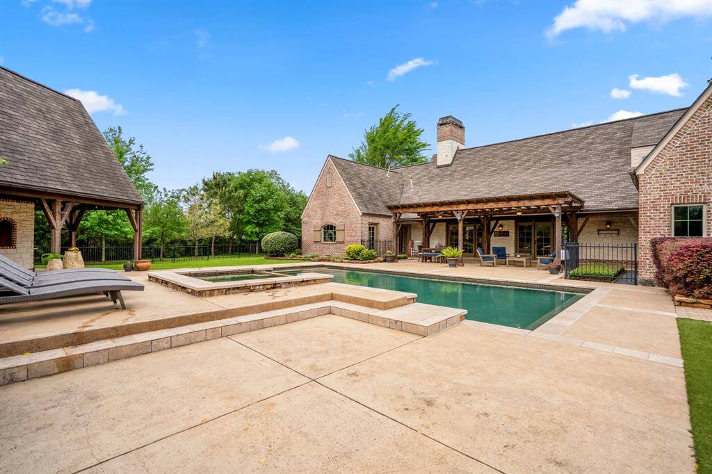 So much deck space surrounding this gorgeous pool.