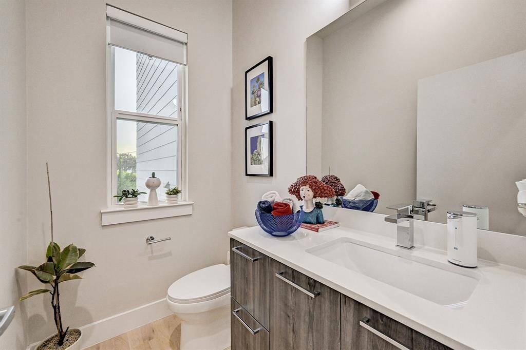 Half bath located across from the laundry room tucked away on the 2nd floor.
