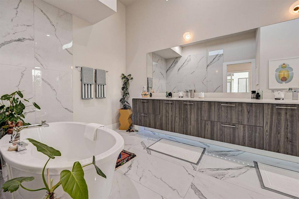 Ensuite retreat with natural morning light above the vanity