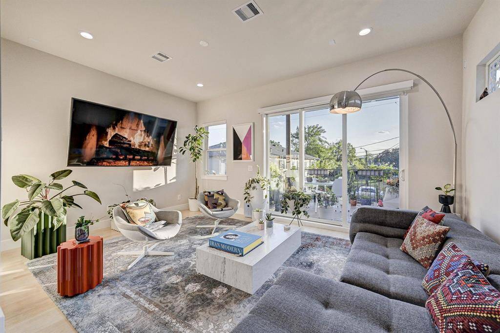Spacious living room flooded with natural light