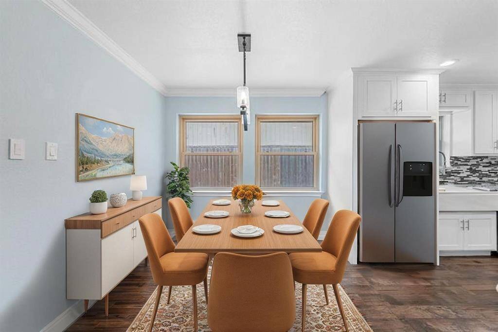 Virtually Staged: Enjoy a meal in this lovely breakfast nook, featuring plenty of natural lighting!