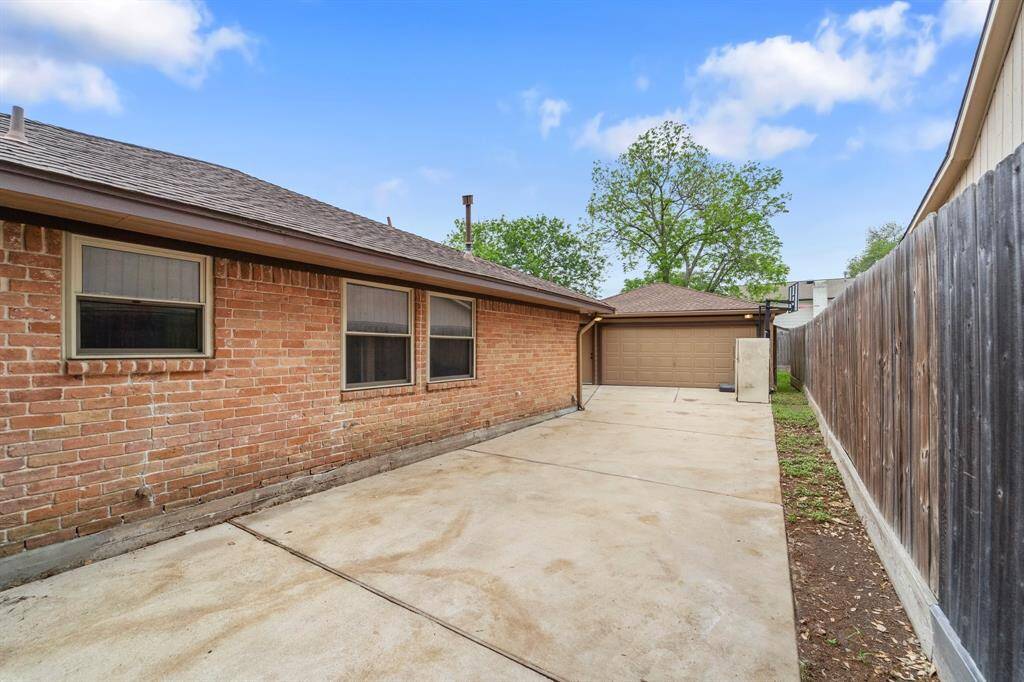 It features a secure, gated two-car garage, offering both privacy and convenience in a sought-after location.