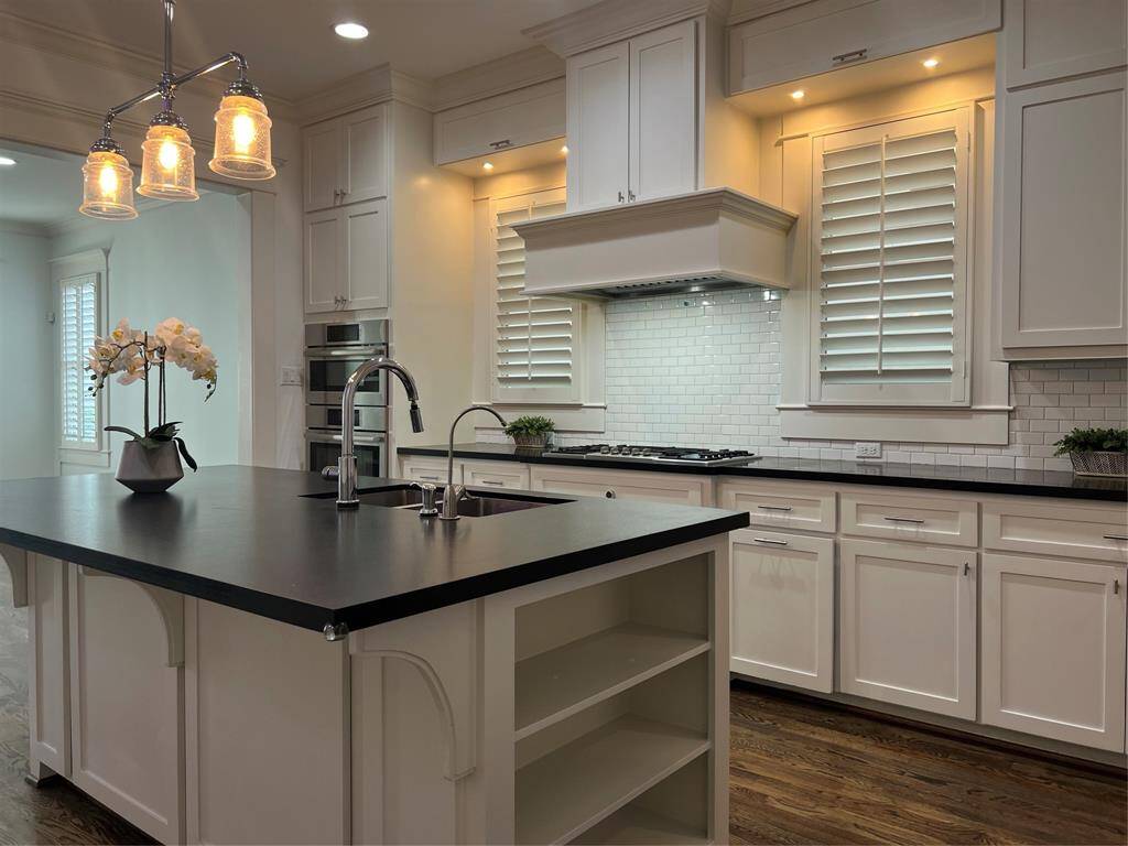 The kitchen has Stainless steal Appliances