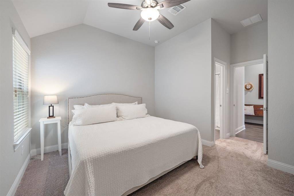 This spare bedroom has en suite bathroom facilities.