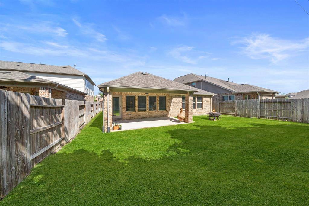 It is securely enclosed by a sturdy fence installed in 2017. With no neighbors in the back of the property, this backyard is a ideal spot for private stress-free relaxation.