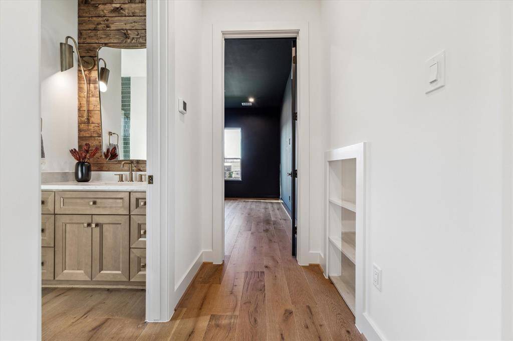 View the guest bedroom or home office with full bathroom access.