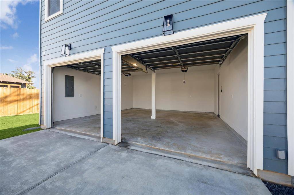 Large 2-car garage and long driveway.