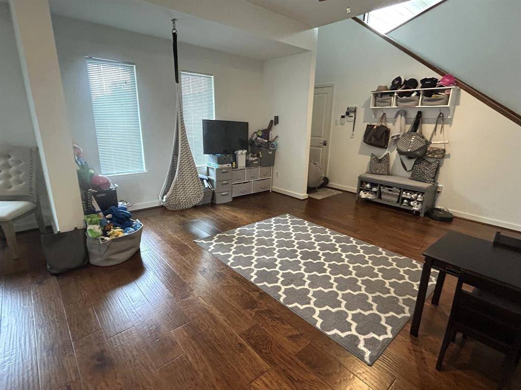 Next to the dining room is an another sitting room or play room
