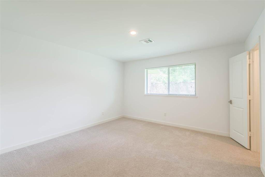 Secondary bedroom #1 with walk-in closet