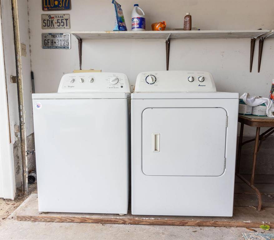 Washer and electric dryer are both in the garage remain with the property.