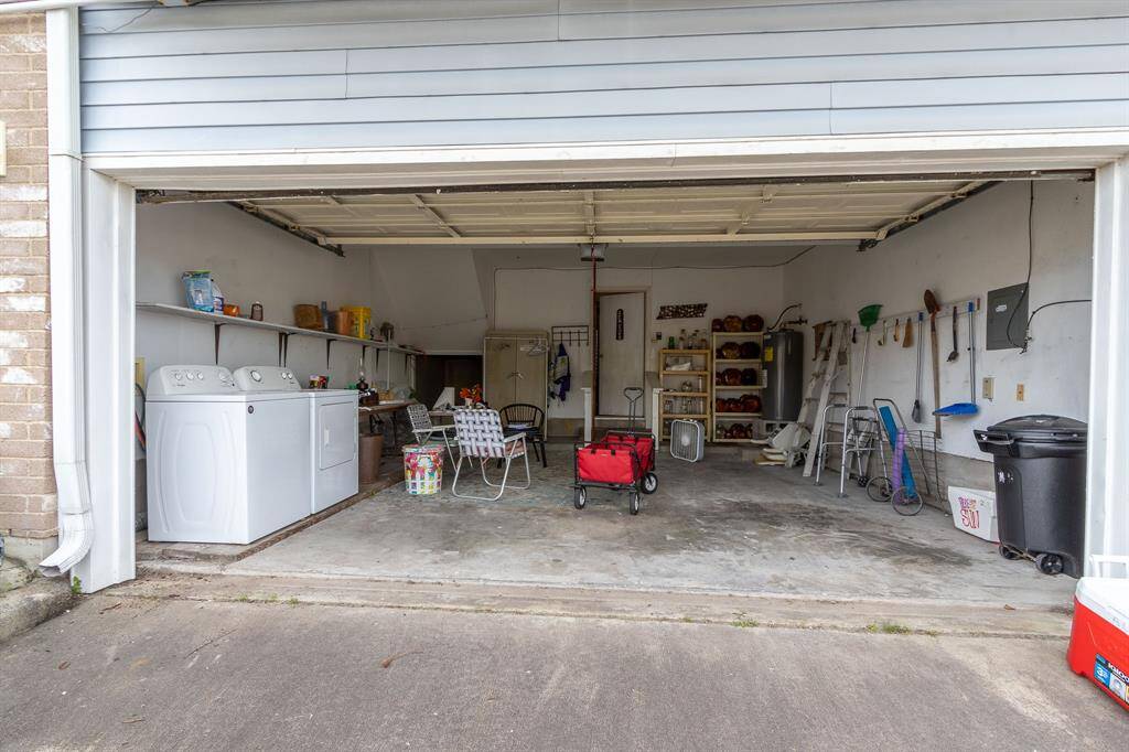 Garage drive-in from the north side of the property.