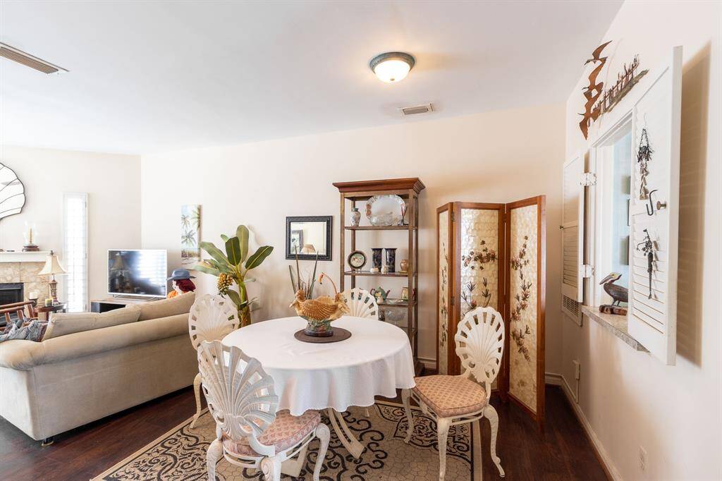 Dining area with living to the left and kitchen to the immediate right.