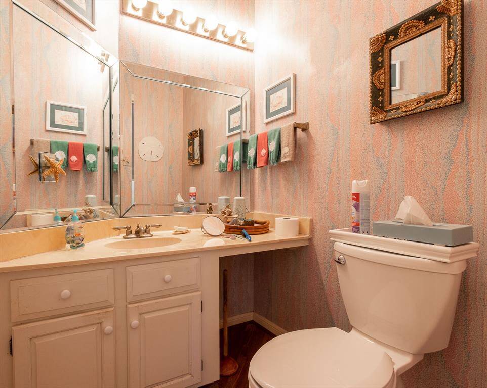 This is the half bath for the condo.  It is on the same floor as the kitchen, living and dining area.