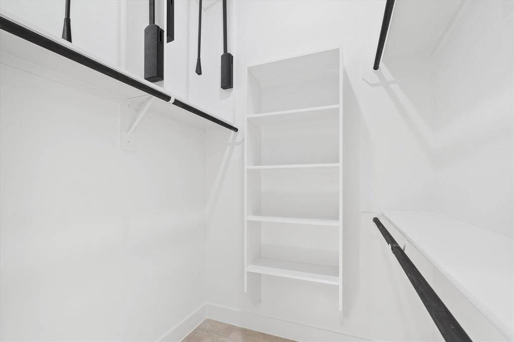 Step into the en suite bath, with a stand up shower, linen closet (not pictured) and modern finishes!