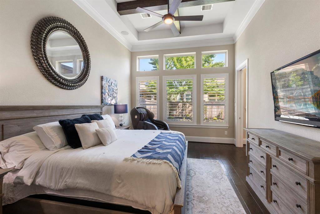 Large primary bedroom with a sitting area on the first floor.