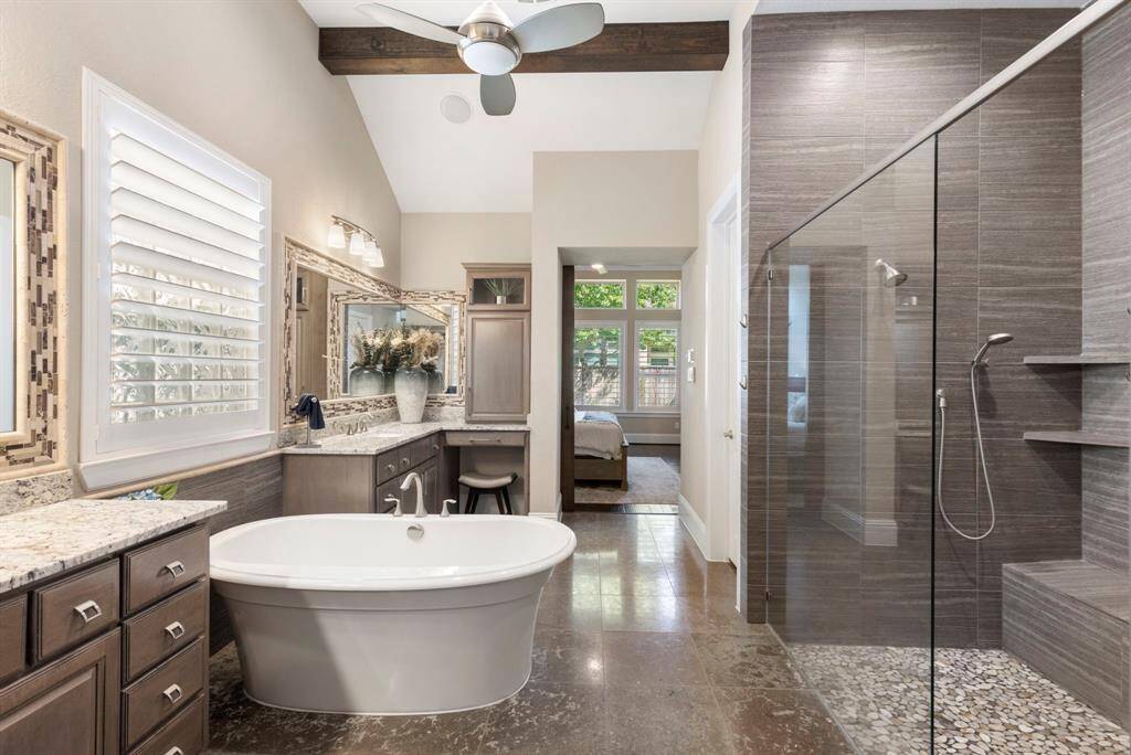 Soaking tub and spa-like shower.