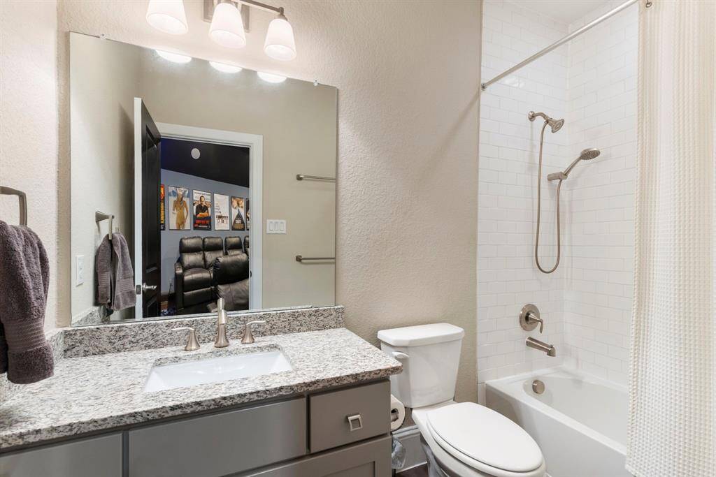 Media room also has a full bathroom.  Bathroom #4.