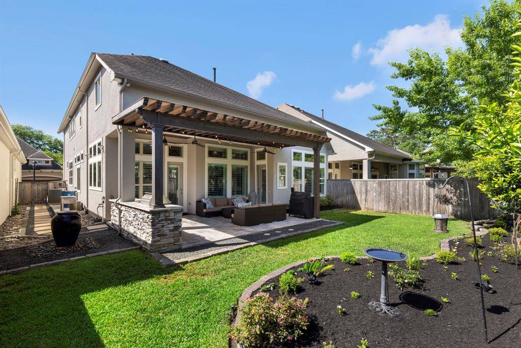 Landscpaing is professionally designed.  The HOA mows the back AND the front yard!