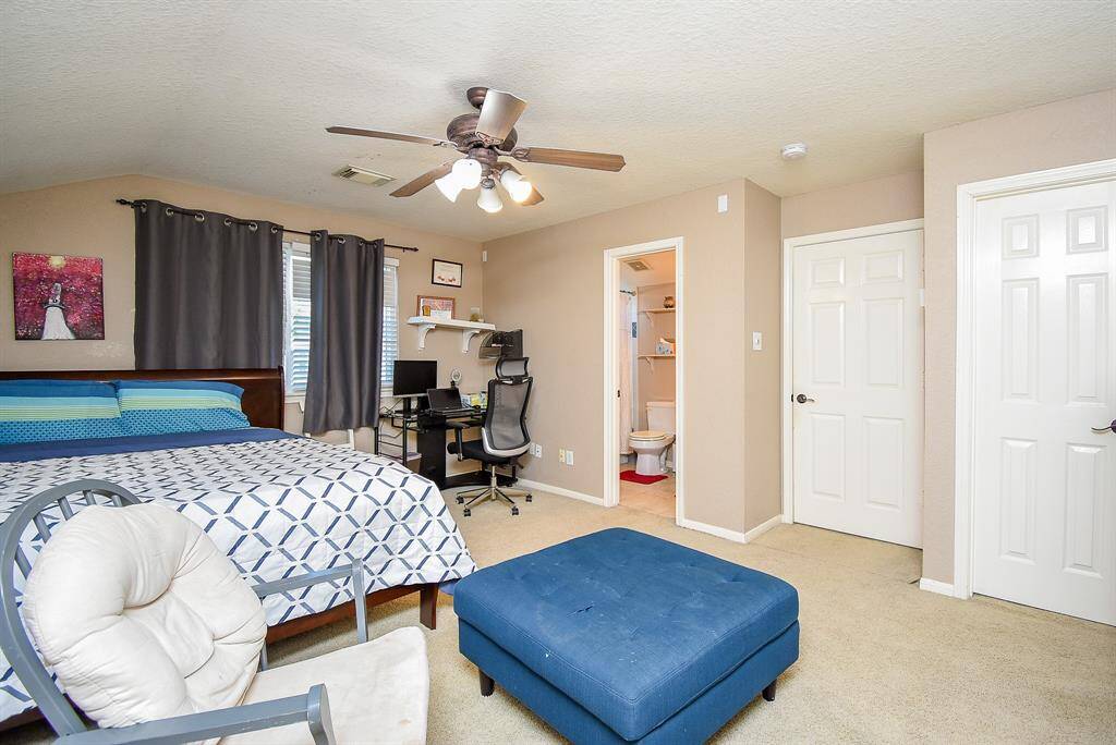 This spacious bedroom on second floor includes a cozy seating area and a private bathroom. The area can be used as game room or flex space....
