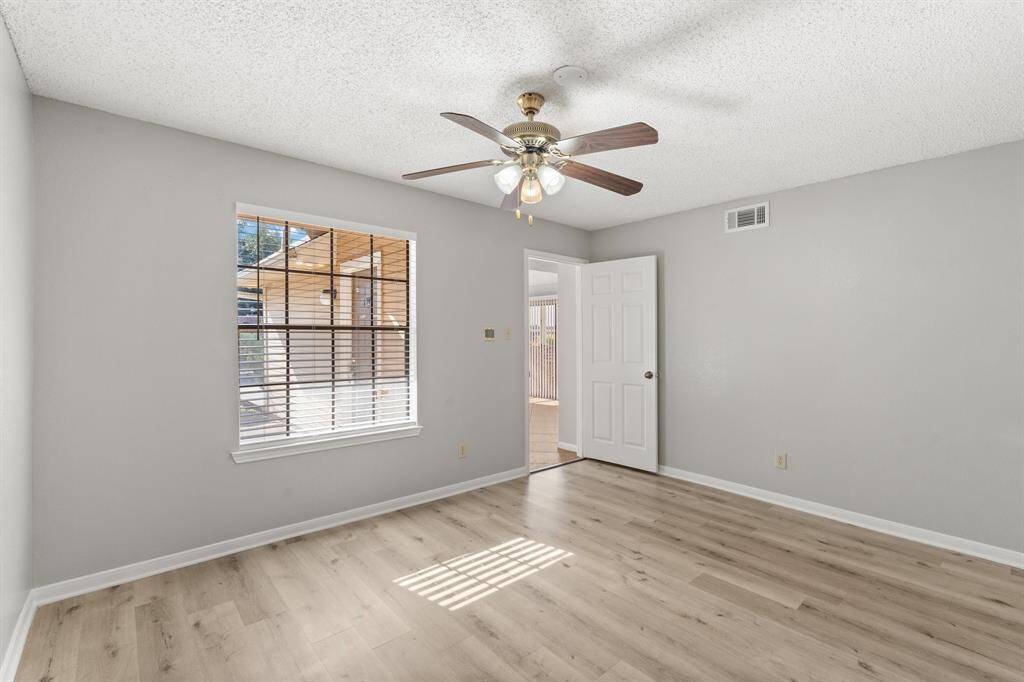Welcome to the Prestigious Primary Suite which features upgraded flooring, oversized window to allow in natural light and convenient access to the Primary Bath Oasis.