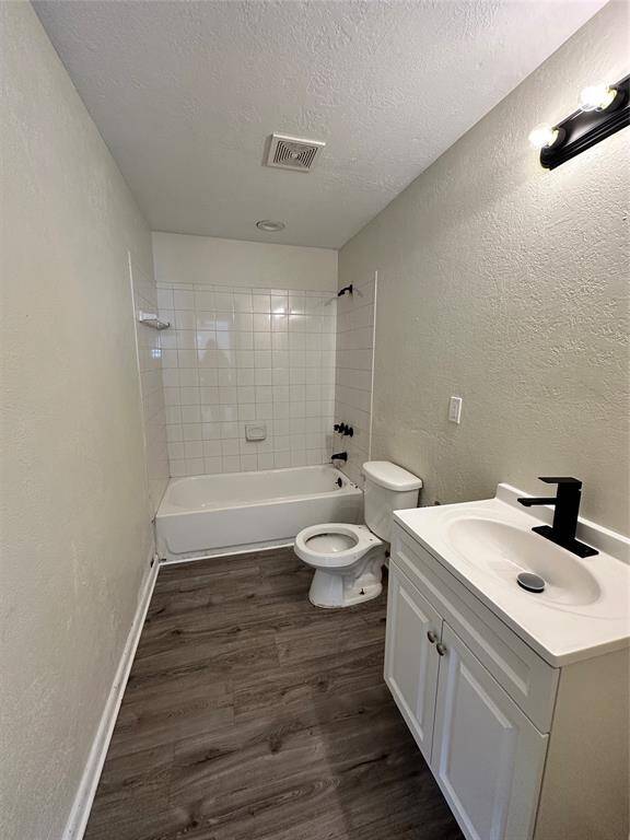 Luxurious primary suite with attached bathroom for ultimate convenience and comfort.
