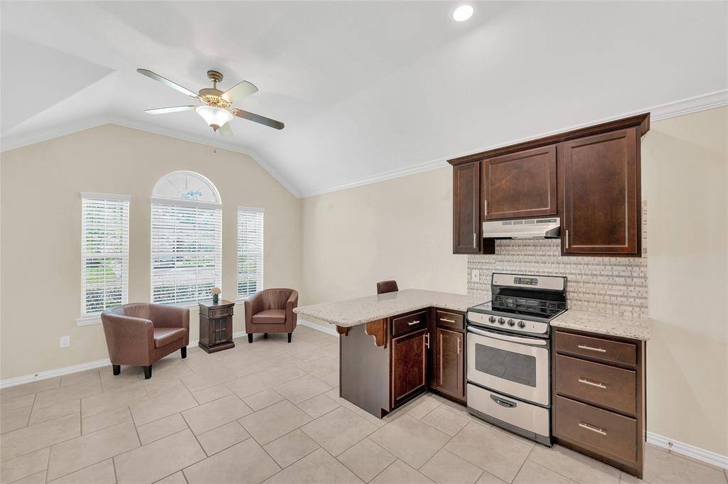 The Next Gen suite was upgraded to include a breakfast bar, full-size range with a vented hood, additional cabinetry, and counterspace. Most Lennar Next Gen Homes DO NOT come with this upgraded addition.