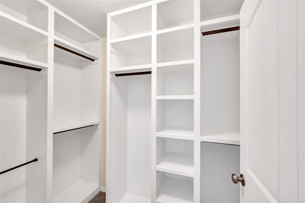 Next Gen suite with a fully customized closet build out with ample storage and hanging space.