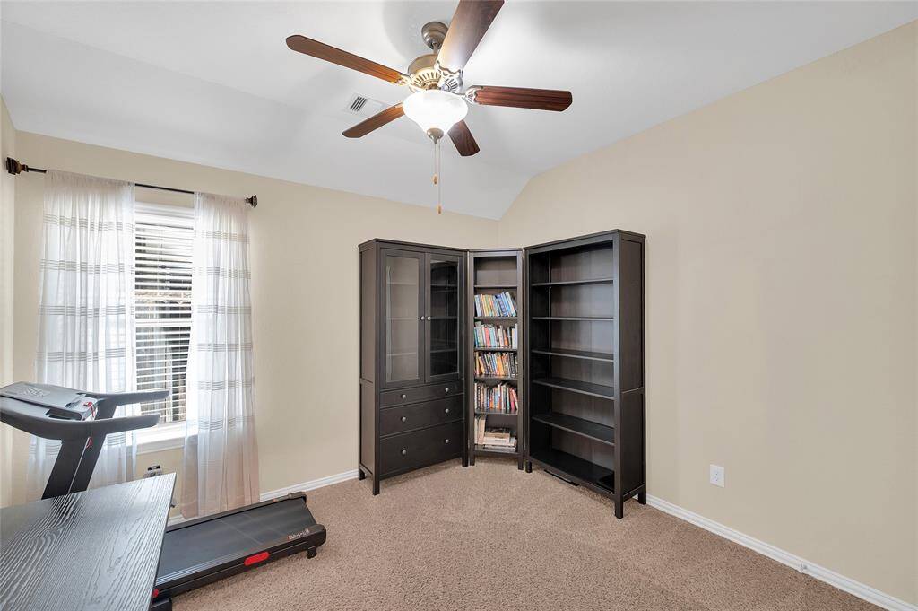 2nd main floor bedroom is currently being used as an office.