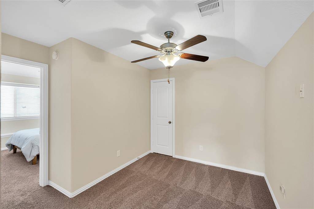 Another view of the upstairs loft. It could used as an office, playroom or game room.