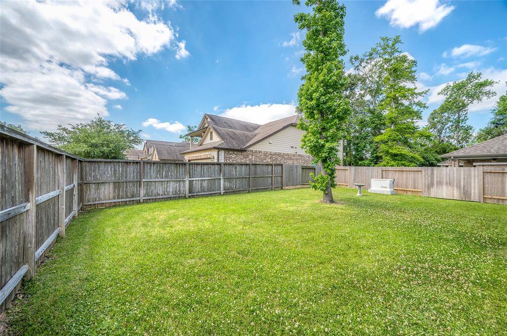 Spacious backyard on a corner lot for extra privacy.