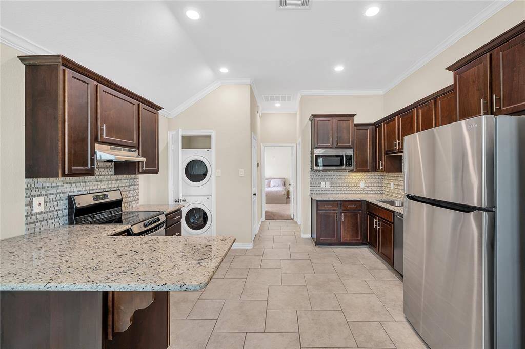 Next Gen suite with fully equipped kitchen with ample cabinetry and counterspace.