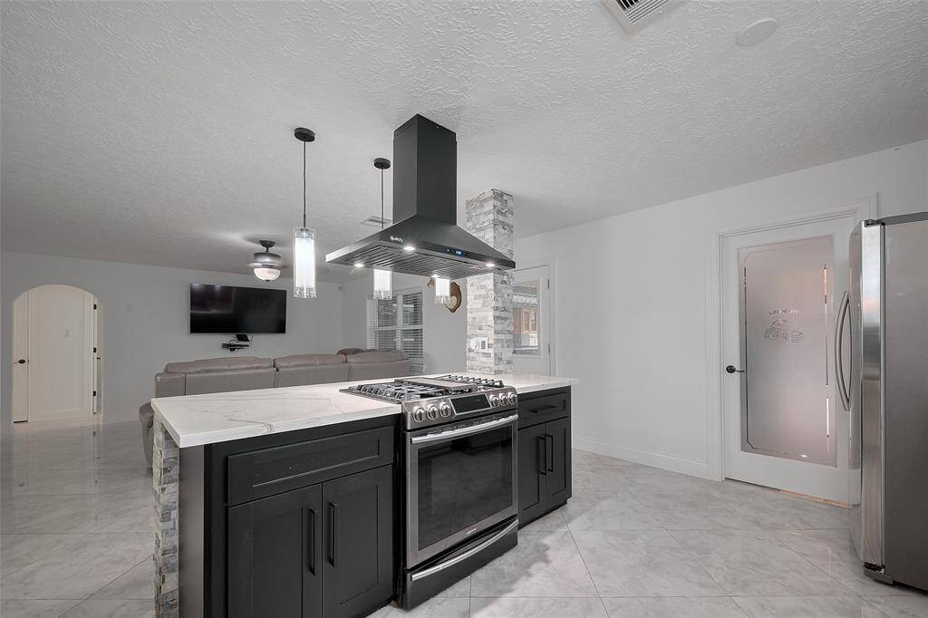 The utility room leads to the covered patio as well