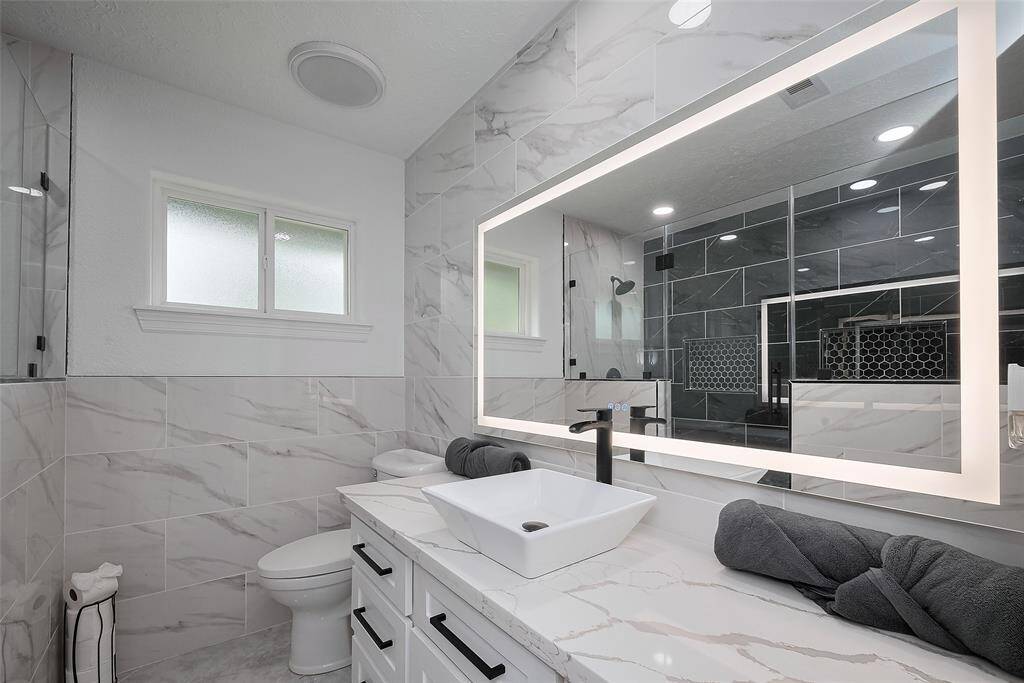 The exhaust fans in the bathrooms double as extra lighting as well