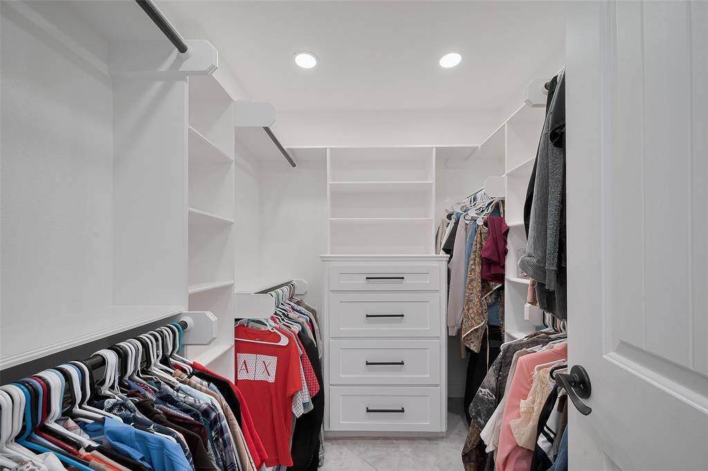 Spacious walk-in closet in the primary  with extra storage