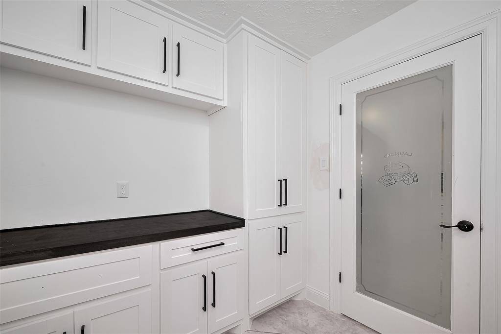 Functionality was top of mind while renovating the utility room with all of the extra storage space!