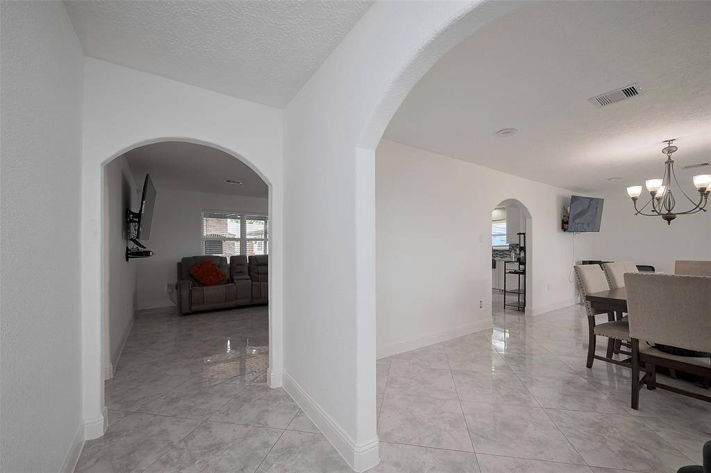 Upon entering the home you will be greeted by a foyer with the dining room to the right and the living room straight ahead