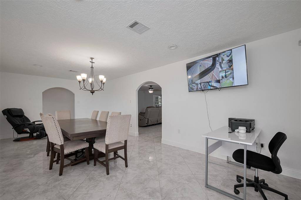 The home comes with a full surveillance system for an added sense of security