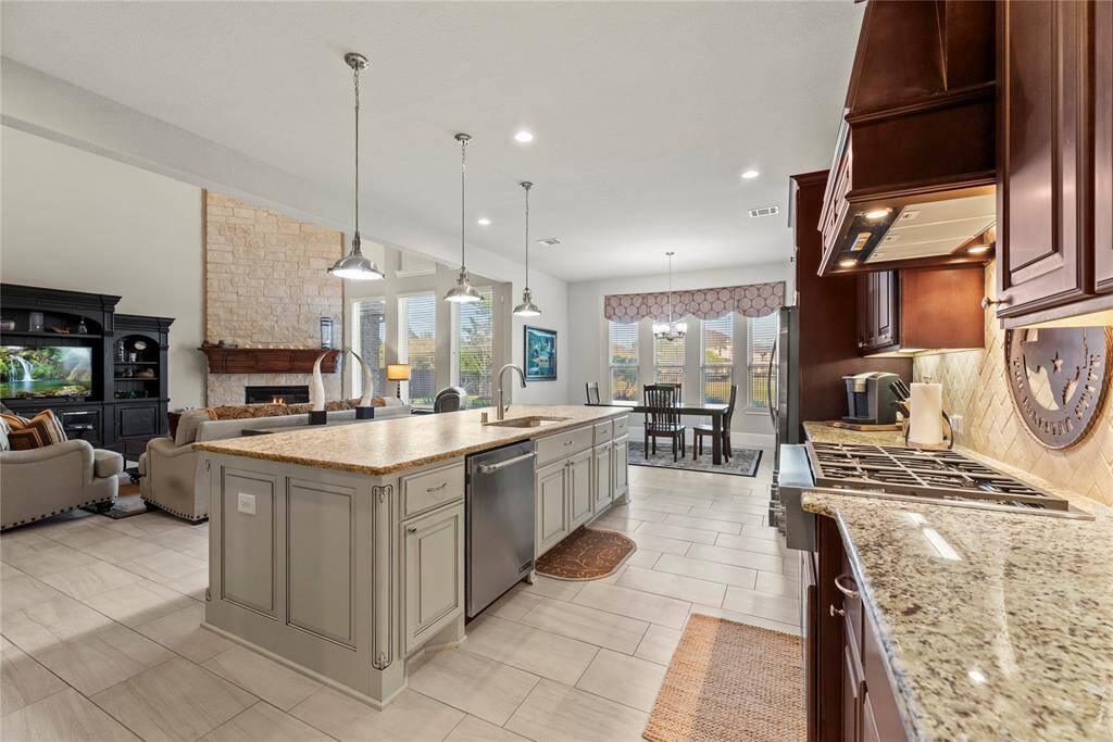 Overall, this chef-inspired kitchen combines style, functionality, and comfort to create a space that's both practical and beautiful—a place where culinary creativity can flourish, and memories can be made.