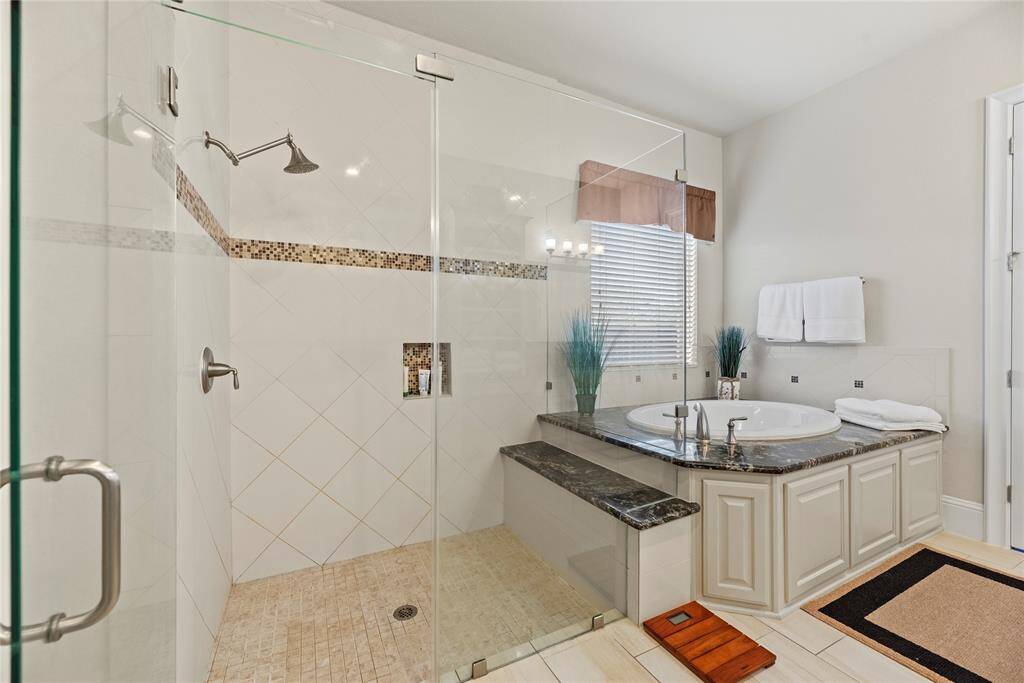 Relax in your deep soaking tub or opt for a quick rinse in the separate shower.