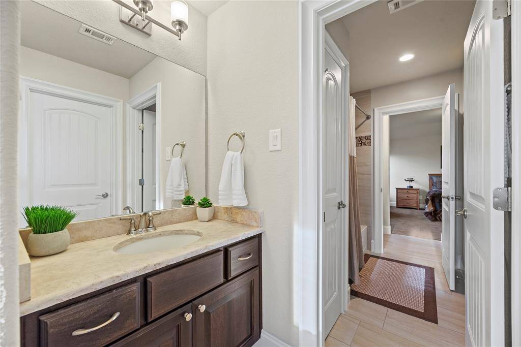 The Hollywood bath features a spacious vanity, making busy mornings a breeze for the whole family.