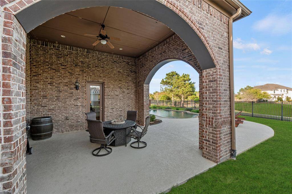 The extended-covered patio is an easy place to sit back and watch the sunset or just get some “you time” in the fresh air.