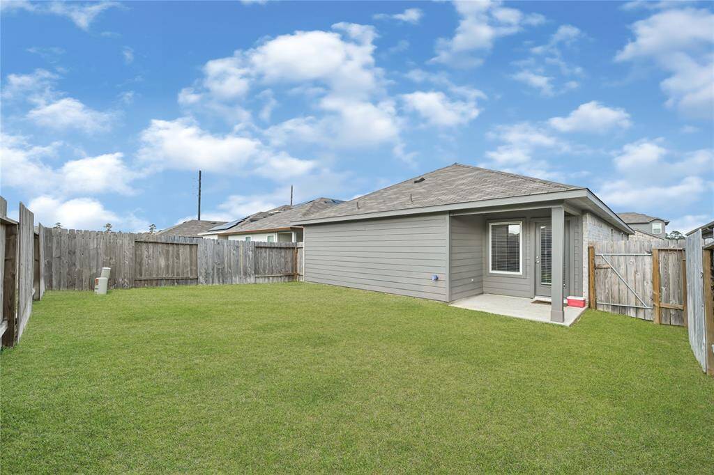 Good size yard with covered patio.