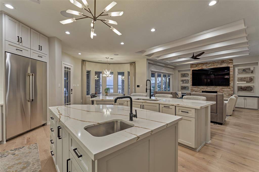 This awe-inspiring kitchen was designed for convenience and functionality as well as it's resplendent beauty.