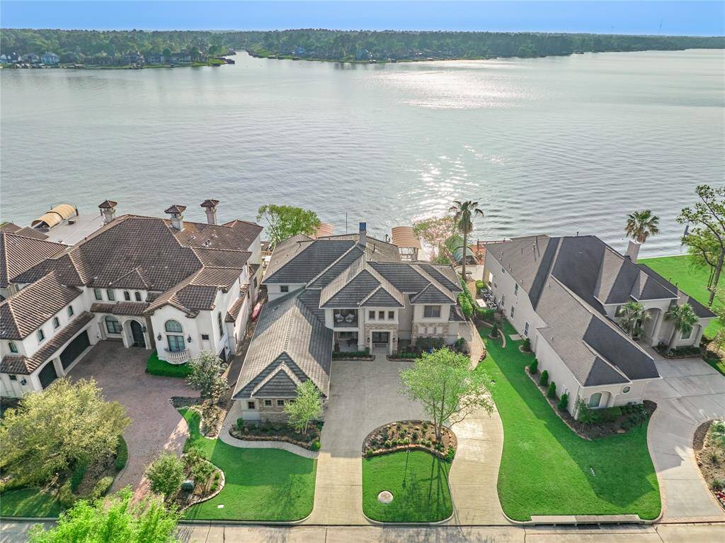 This remarkable 4 bedroom, 4 ensuite bath spans approximately 5,839 square feet and showcases a plethora of luxurious amenities and finishes.
