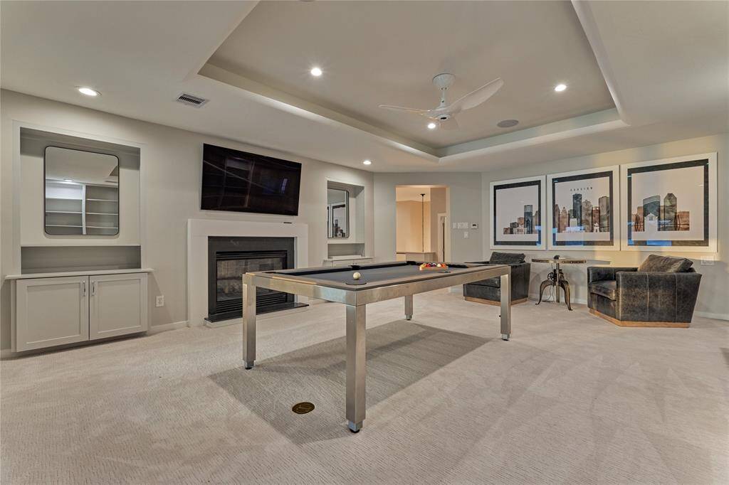 The game room provides extra space for entertaining. Whether its for adults or teenagers, this space provides options for everyone.